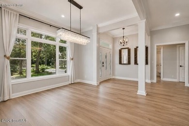 Welcome home to this beautifully designed 4-bedroom, 2.5-bath - photo 6
