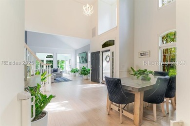 This stunning, end-unit townhome features a grand two-story - photo 6