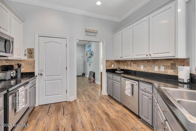 Welcome home to this beautifully designed 4-bedroom, 2.5-bath - photo 9