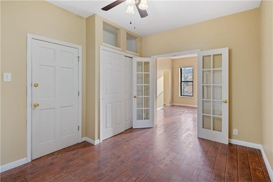 Welcome home to this elegant three-level two family brick home - photo 5