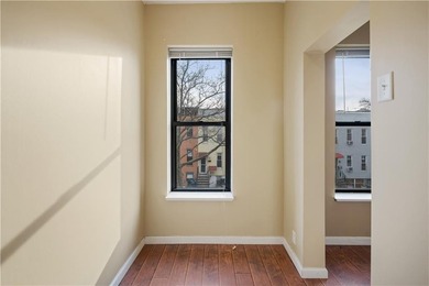 Welcome home to this elegant three-level two family brick home - photo 9