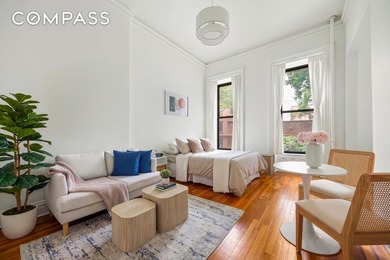 Set within a charming late-19th-century brownstone on one of - photo 1