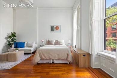Set within a charming late-19th-century brownstone on one of - photo 2