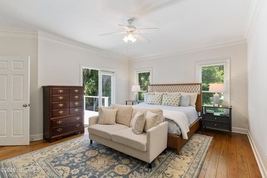 Nestled beneath a mature oak tree and surrounded by established - photo 9