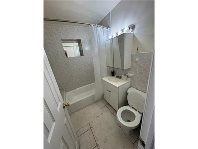 Remarkable three family semi-detached home located conveniently - photo 10