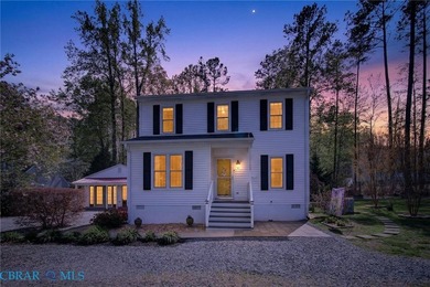 Discover effortless living in Urbanna Creek Farms with this - photo 2