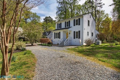 Discover effortless living in Urbanna Creek Farms with this - photo 3