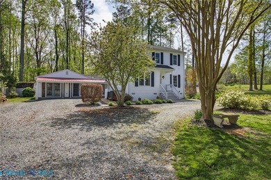 Discover effortless living in Urbanna Creek Farms with this - photo 4