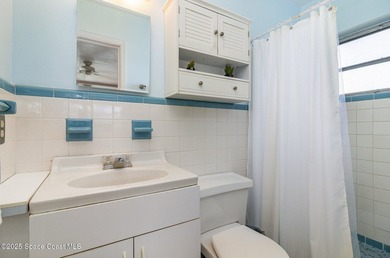 Bright & Cheery Retro Beach Home! You'll fall in love with this - photo 12