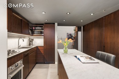 Welcome to Unit 309 at 67 East 11th Street - a stunningly - photo 3
