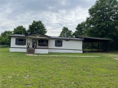 Discover easy lake-country living in this charming 3-bedroom - photo 1