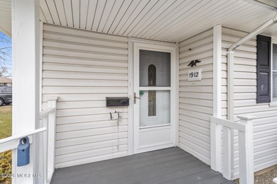 Approach this home via a low-maintenance composite deck with a