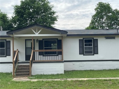 Discover easy lake-country living in this charming 3-bedroom - photo 3