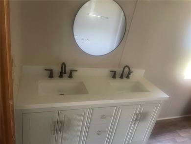 Discover easy lake-country living in this charming 3-bedroom - photo 5