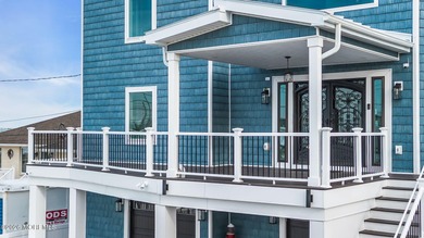 Bayfront custom build  Panoramic bay views  Rooftop deck