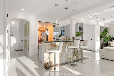 Set in Coral Cay - Huntington Harbour's most coveted 24-hour - photo 11