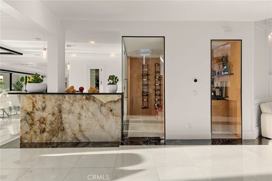 Set in Coral Cay - Huntington Harbour's most coveted 24-hour - photo 13