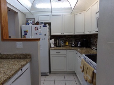 Wow! Looking for a first floor unit? You have found it! And the - photo 18