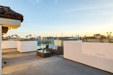 Set in Coral Cay - Huntington Harbour's most coveted 24-hour - photo 18