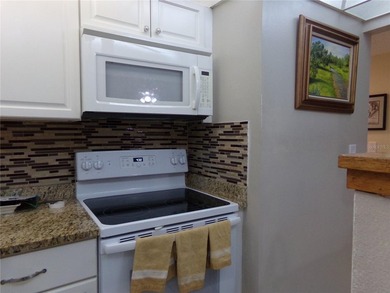 Wow! Looking for a first floor unit? You have found it! And the - photo 19
