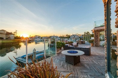 Set in Coral Cay - Huntington Harbour's most coveted 24-hour - photo 20