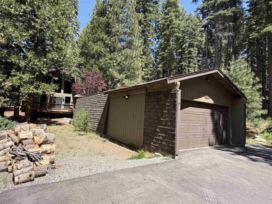 Escape to your own cozy cabin tucked away in the serene woods of - photo 2