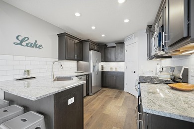 Experience luxury lakefront living on beautiful Houghton Lake in - photo 29