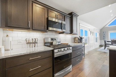 Experience luxury lakefront living on beautiful Houghton Lake in - photo 32