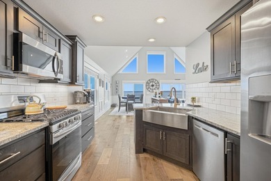 Experience luxury lakefront living on beautiful Houghton Lake in - photo 35