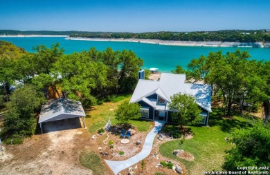 Beautiful waterfront home on 1.38 acres with deep deep water - Lake Home For Sale in Lakehills, Texas