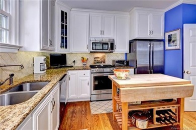 This fabulous golf-front home located on the 9th hole of the - photo 4