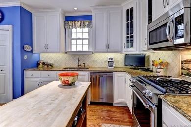 This fabulous golf-front home located on the 9th hole of the - photo 5