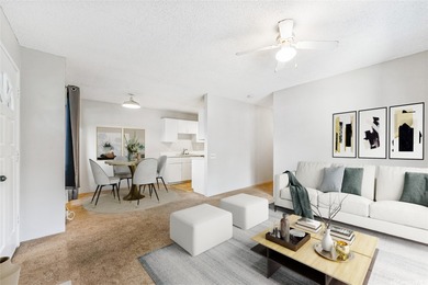 Welcome Home to Palm Villas II! This bright, ground-floor corner