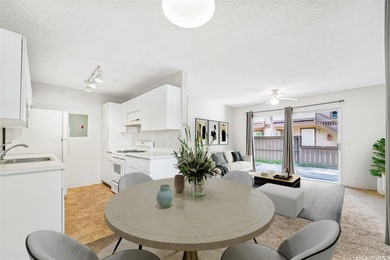 Welcome Home to Palm Villas II! This bright, ground-floor corner