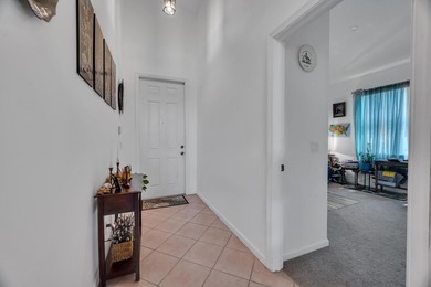 Nestled in the desirable gated community of Magnolia Lakes in - photo 11