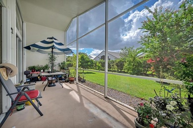 Nestled in the desirable gated community of Magnolia Lakes in - photo 18