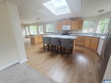 Space and natural light abound in this beautifully maintained - photo 6
