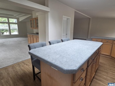 Space and natural light abound in this beautifully maintained - photo 8