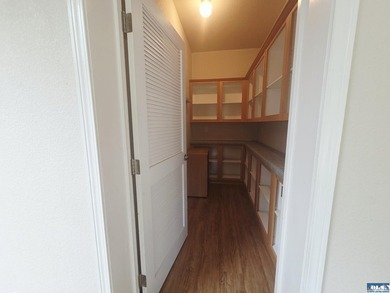 Space and natural light abound in this beautifully maintained - photo 10