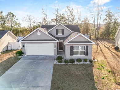 Nestled in a quiet community just minutes away from downtown