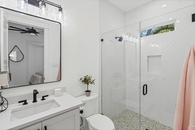 This stunning custom modern home is an exceptional 4-bedroom - photo 22