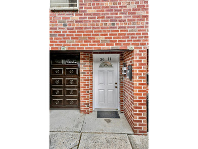 36-11 Utopia Parkway is a detached brick legal 2-family home - photo 5
