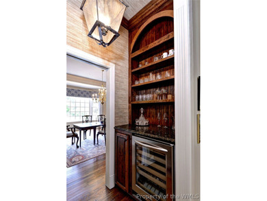 Enjoy gracious living in this stately golf-front brick home in - photo 10