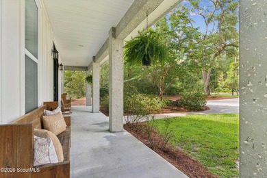 Welcome to this stunning custom-built marsh front home in the - photo 4
