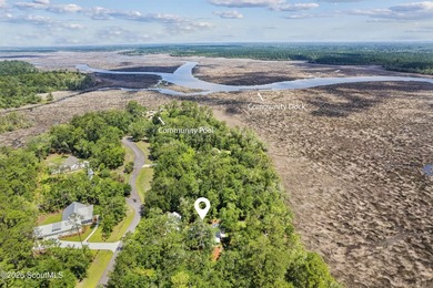 Welcome to this stunning custom-built marsh front home in the - photo 6
