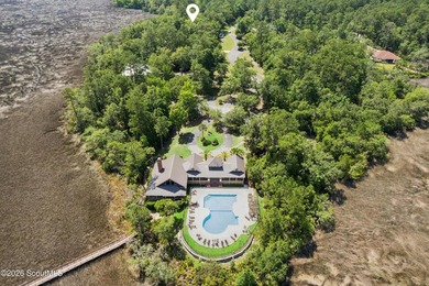 Welcome to this stunning custom-built marsh front home in the - photo 9