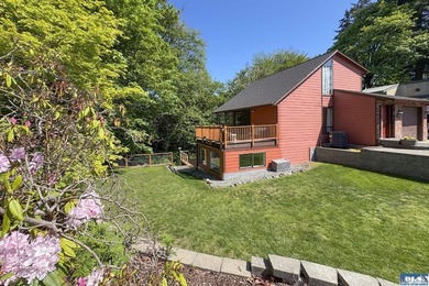 Tucked into a peaceful, creekside setting, this 3-bedroom - photo 2
