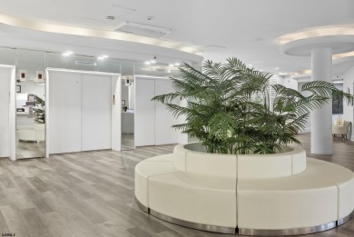 Exceptional shorefront living! This beautifully renovated condo