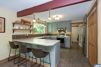 Tucked into a peaceful, creekside setting, this 3-bedroom - photo 10
