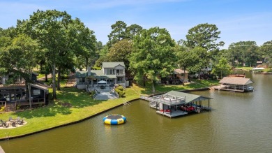 This delightful lakehouse offers wonderful unobstructed views - Lake Home For Sale in Henderson, Texas